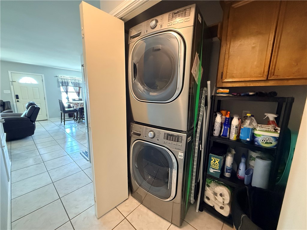 1938 El Monte Street Corpus Christi, TX 78417 - Photo 6 of 9 a view of a washer and dryer in a room