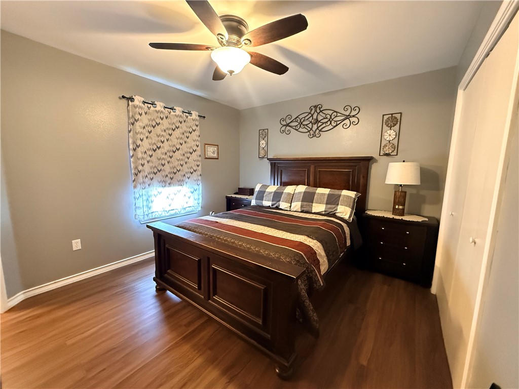 1938 El Monte Street Corpus Christi, TX 78417 - Photo 7 of 9 a bedroom with a bed and a window
