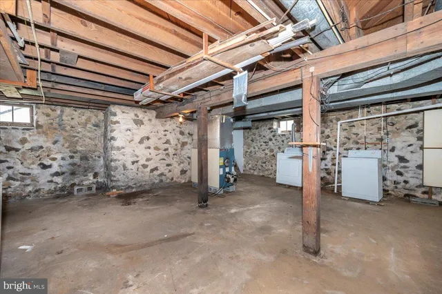 a view of empty room with white doors