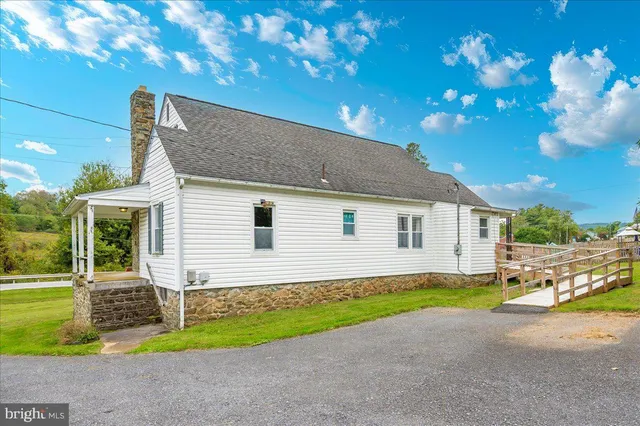 a view of a house with a swimming pool