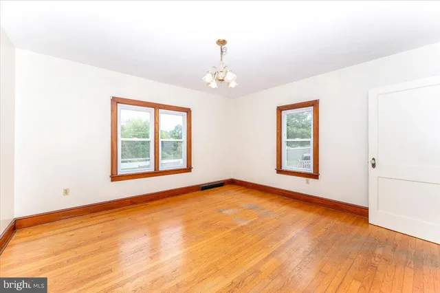 an empty room with windows