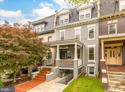 front view of a building with a yard