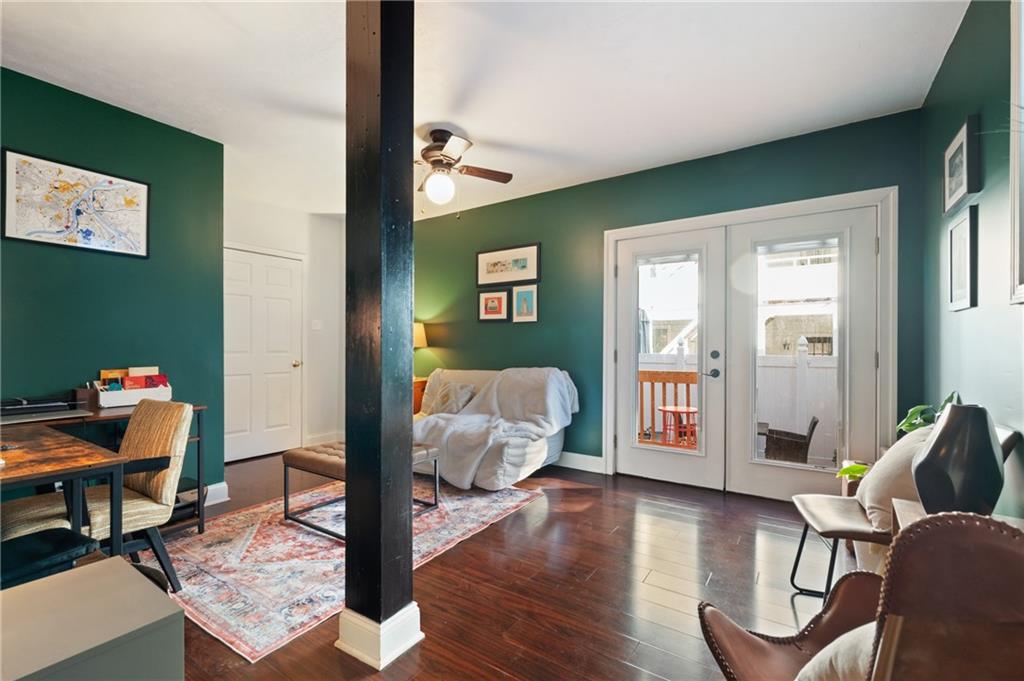 3037 Brereton Street Pittsburgh, PA 15219 - Photo 11 of 36 a living room with furniture and wooden floor