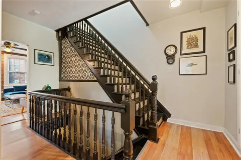 a view of entryway with wooden floor