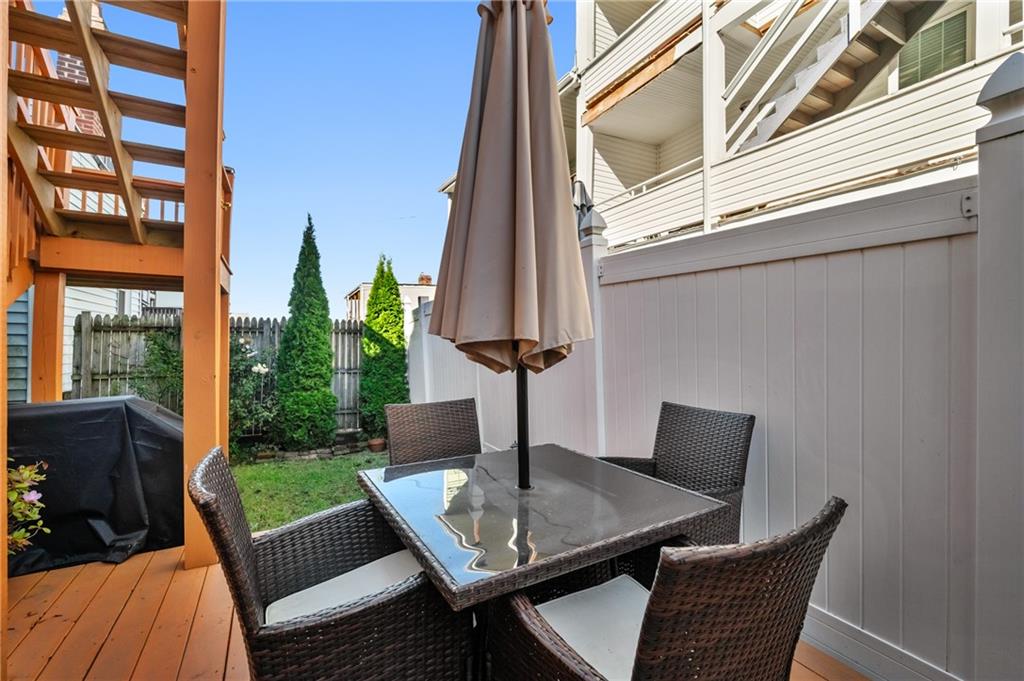 3037 Brereton Street Pittsburgh, PA 15219 - Photo 26 of 36 a view of a patio with a table chairs and a potted plant