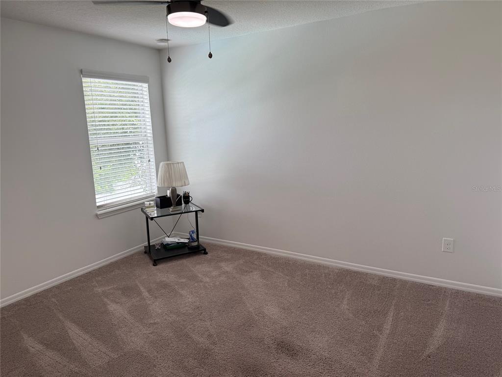 12236 Fairlawn Drive Riverview, FL 33579 - Photo 28 of 52 an empty room with a window