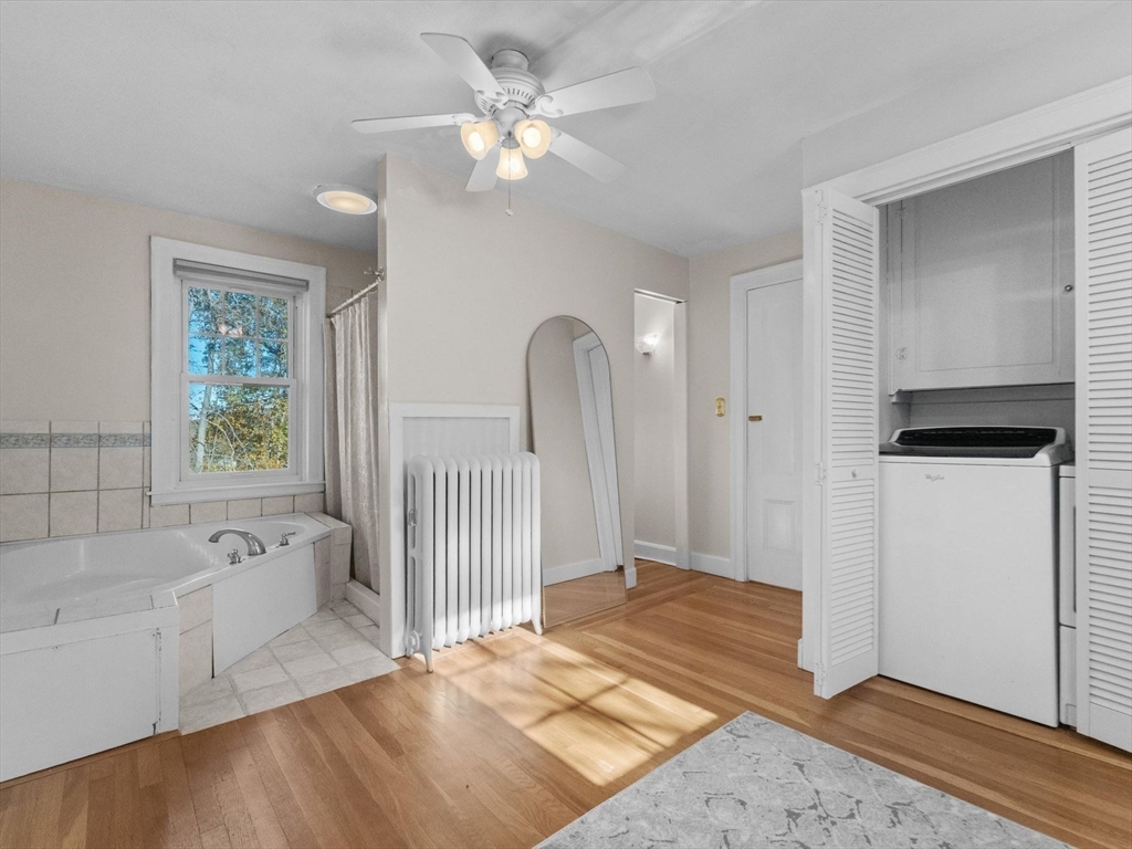 17 Worcester Street Grafton, MA 01519 - Photo 24 of 42 a living room with a bed furniture and a window