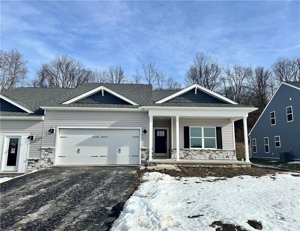 3027 Audrey Drive Greensburg, PA 15601 - Photo 1 of 22 a front view of a house with a yard and garage