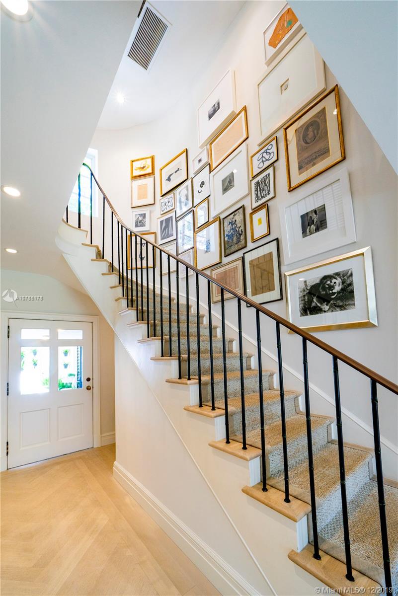 4955 Lakeview Drive Miami Beach, FL 33140 - Photo 41 of 55 wooden floor with windows and stairs