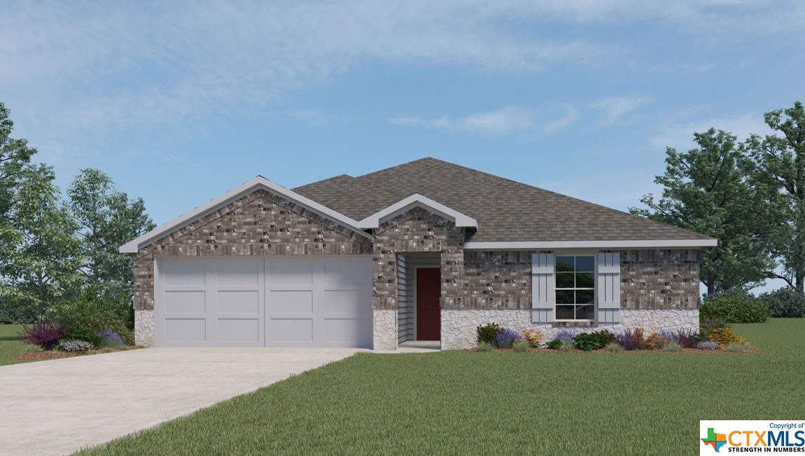 front view of a house with a yard