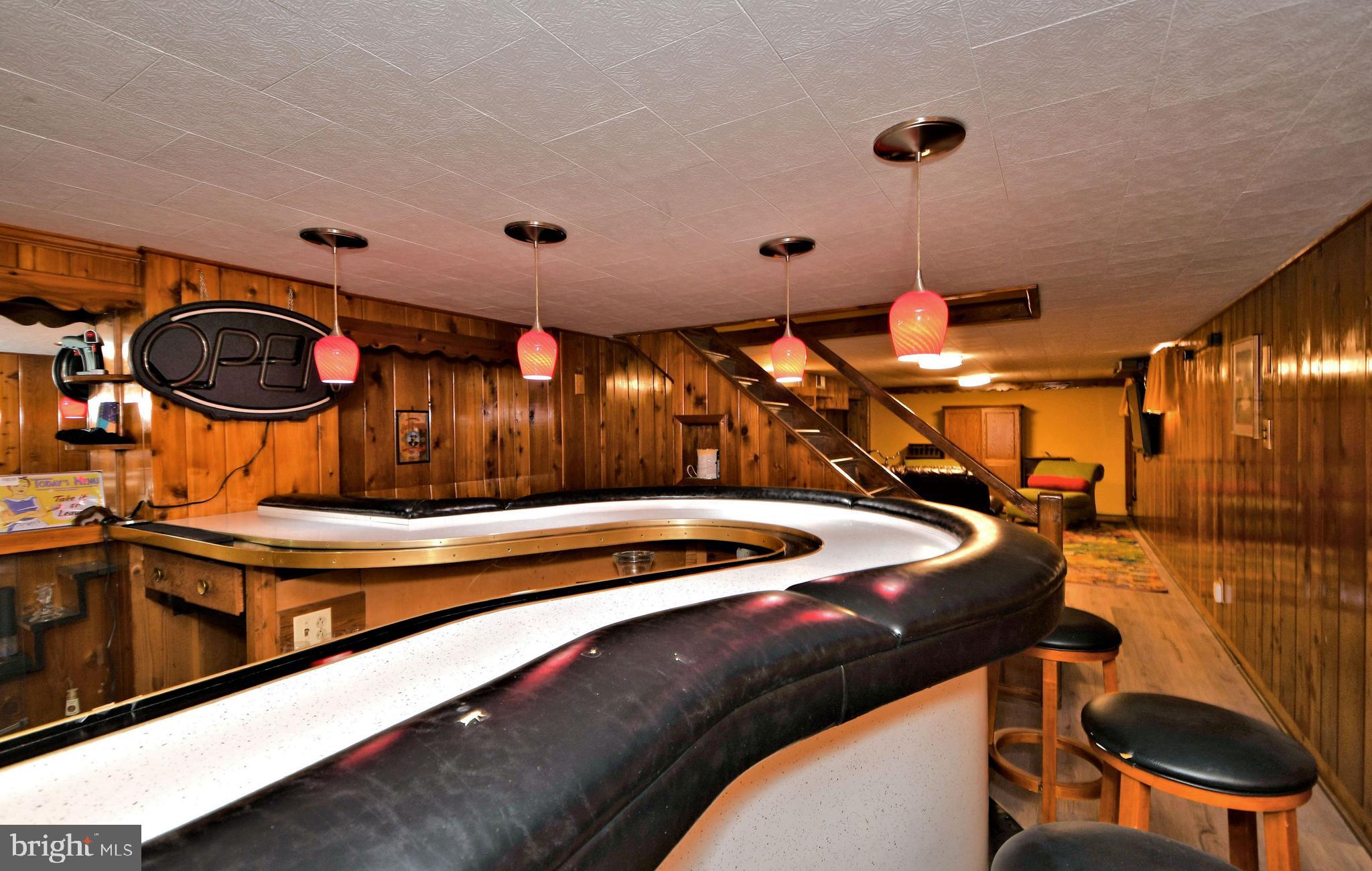 80 North Fairway Road Oreland, PA 19075 - Photo 28 of 31 Large, built-in wet bar with 10 stools
