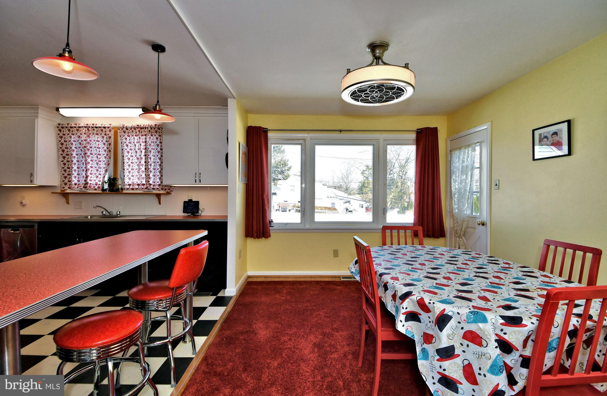 80 North Fairway Road Oreland, PA 19075 - Photo 6 of 31 DR open to kitchen w/door to patio