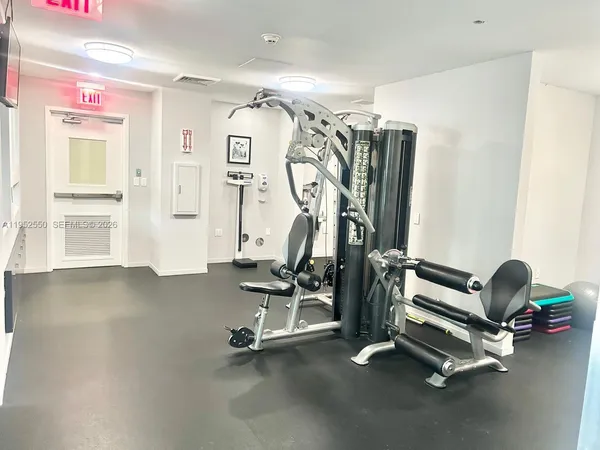 a view of a room with gym equipment