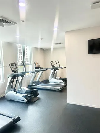 a view of a room with gym equipment