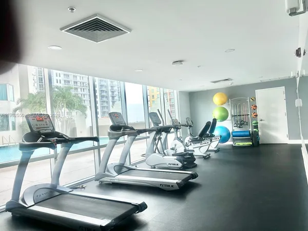 a view of a room with gym equipment