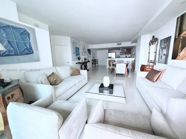 a living room with furniture and a couch