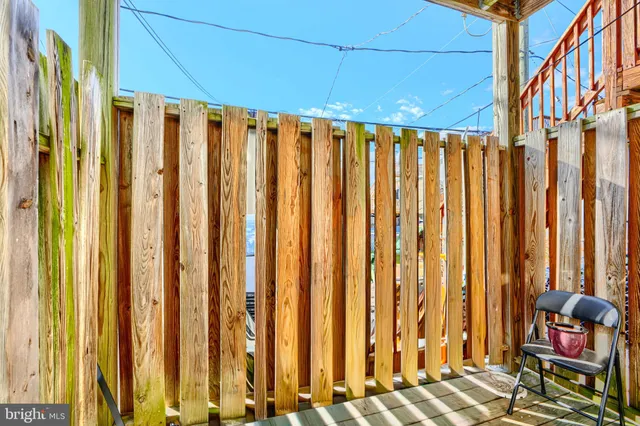 a bedroom with furniture and a fireplace