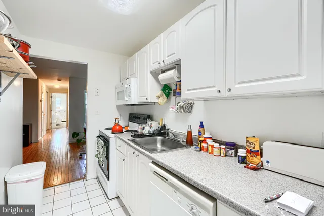 a bedroom with a bed and a closet