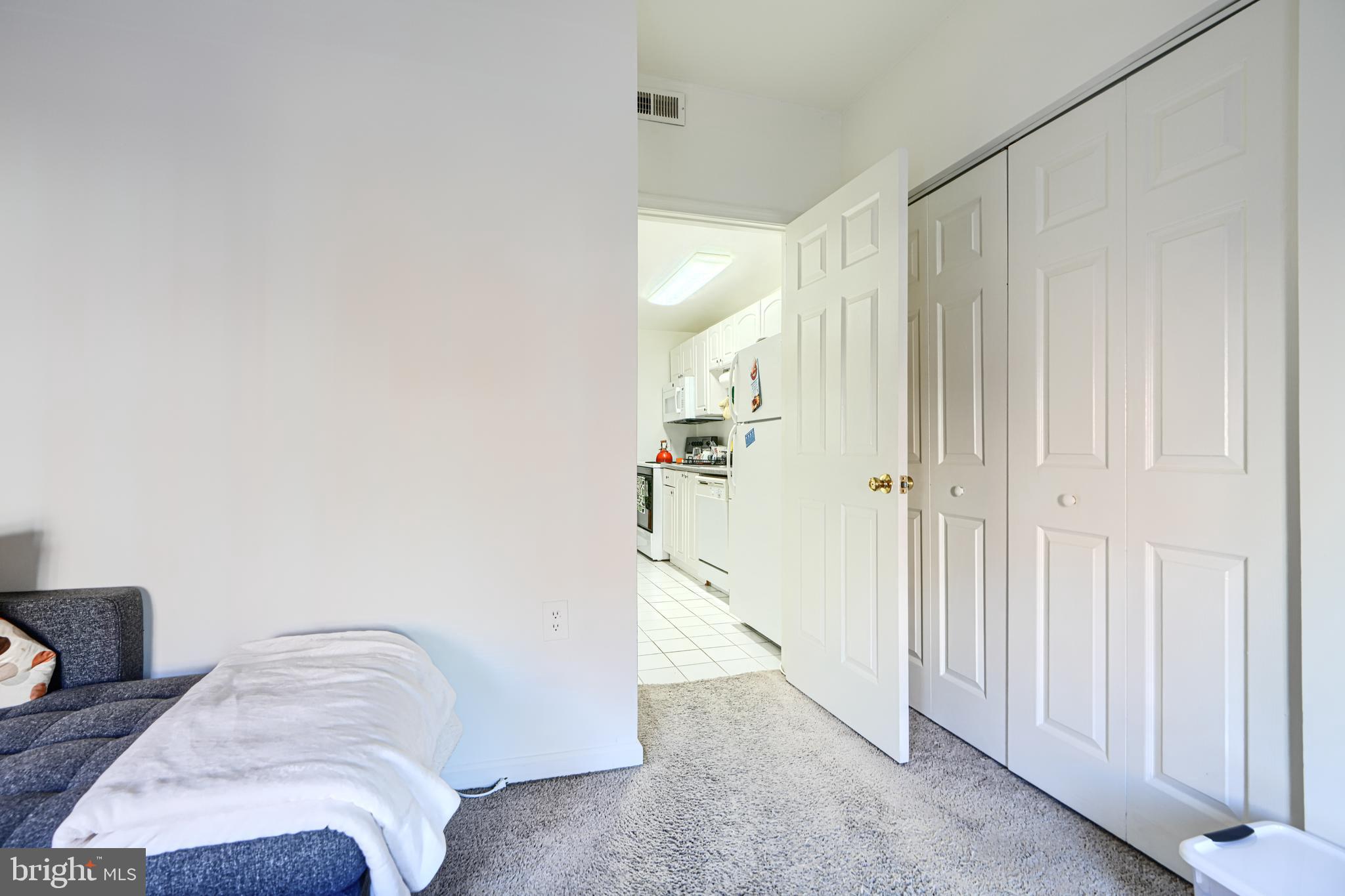 1312 South Hanover Street Baltimore, MD 21230 - Photo 26 of 53 a view of a bedroom with furniture and wooden floor