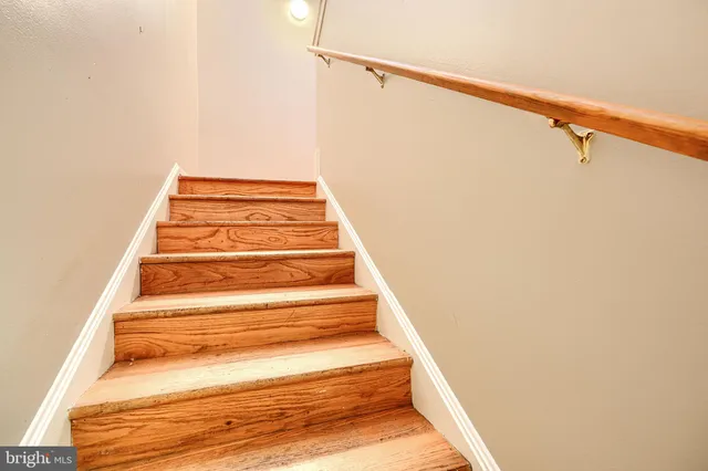 a view of kitchen with wooden floor