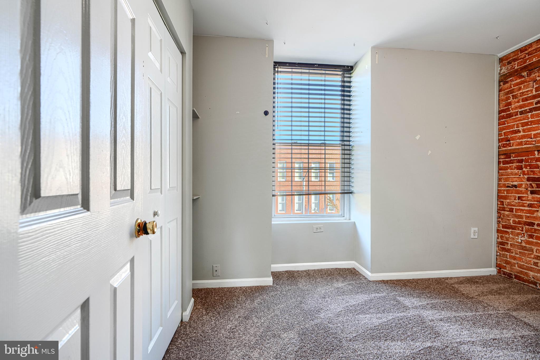 1312 South Hanover Street Baltimore, MD 21230 - Photo 40 of 53 an empty room with windows