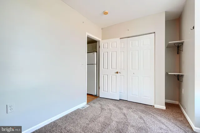 a view of an empty room and window