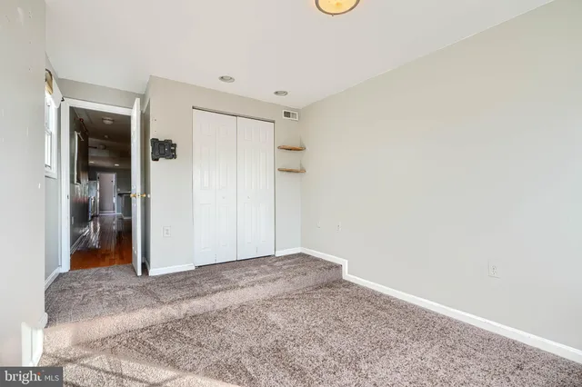 a bathroom with a shower and a toilet