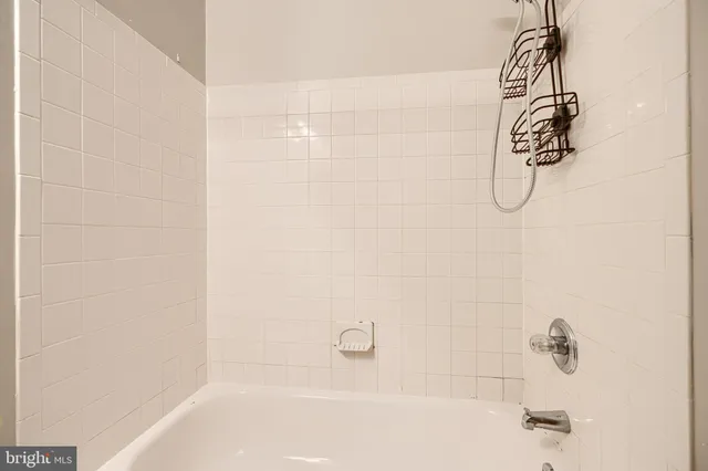 a view of hallway with washer and dryer
