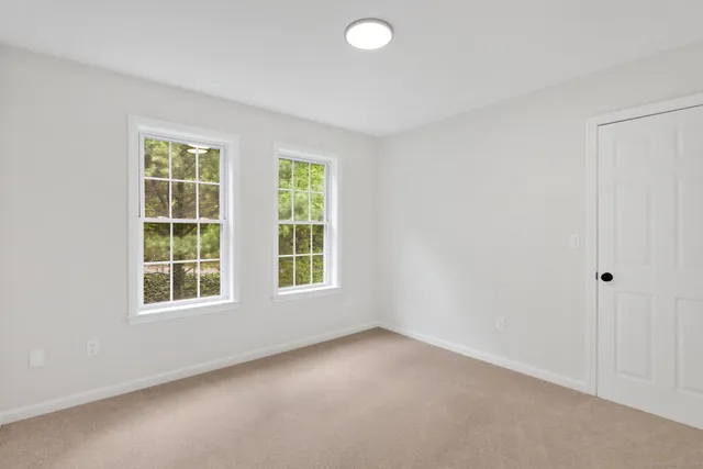 a picture of a book and a white wall