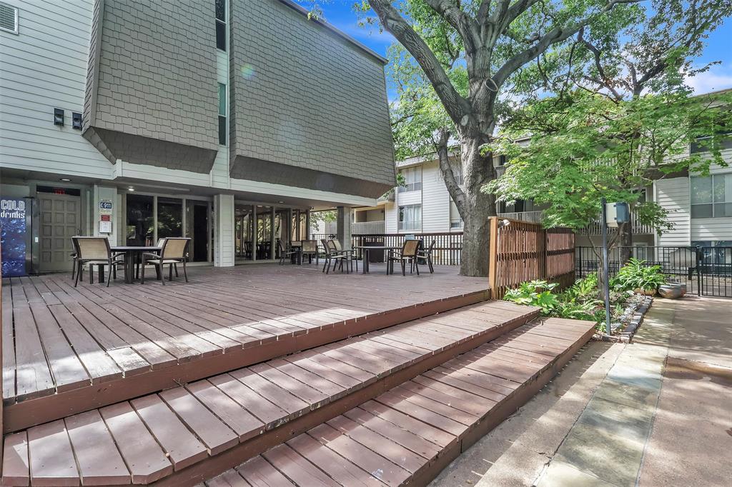 4837 Cedar Springs Road, Unit 321 Dallas, TX 75219 - Photo 13 of 14 a view of a backyard with sitting area