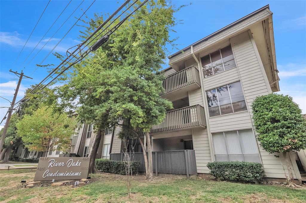 4837 Cedar Springs Road, Unit 321 Dallas, TX 75219 - Photo 14 of 14 a front view of a house with garden