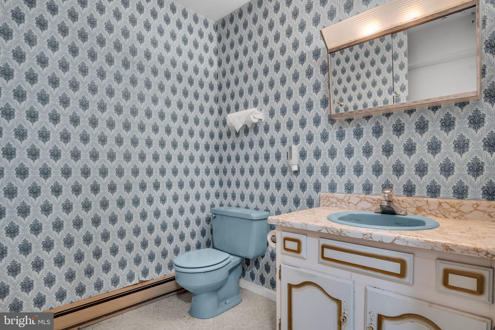 609 Dellville Road Duncannon, PA 17020 - Photo 12 of 48 a bathroom with a toilet and a sink