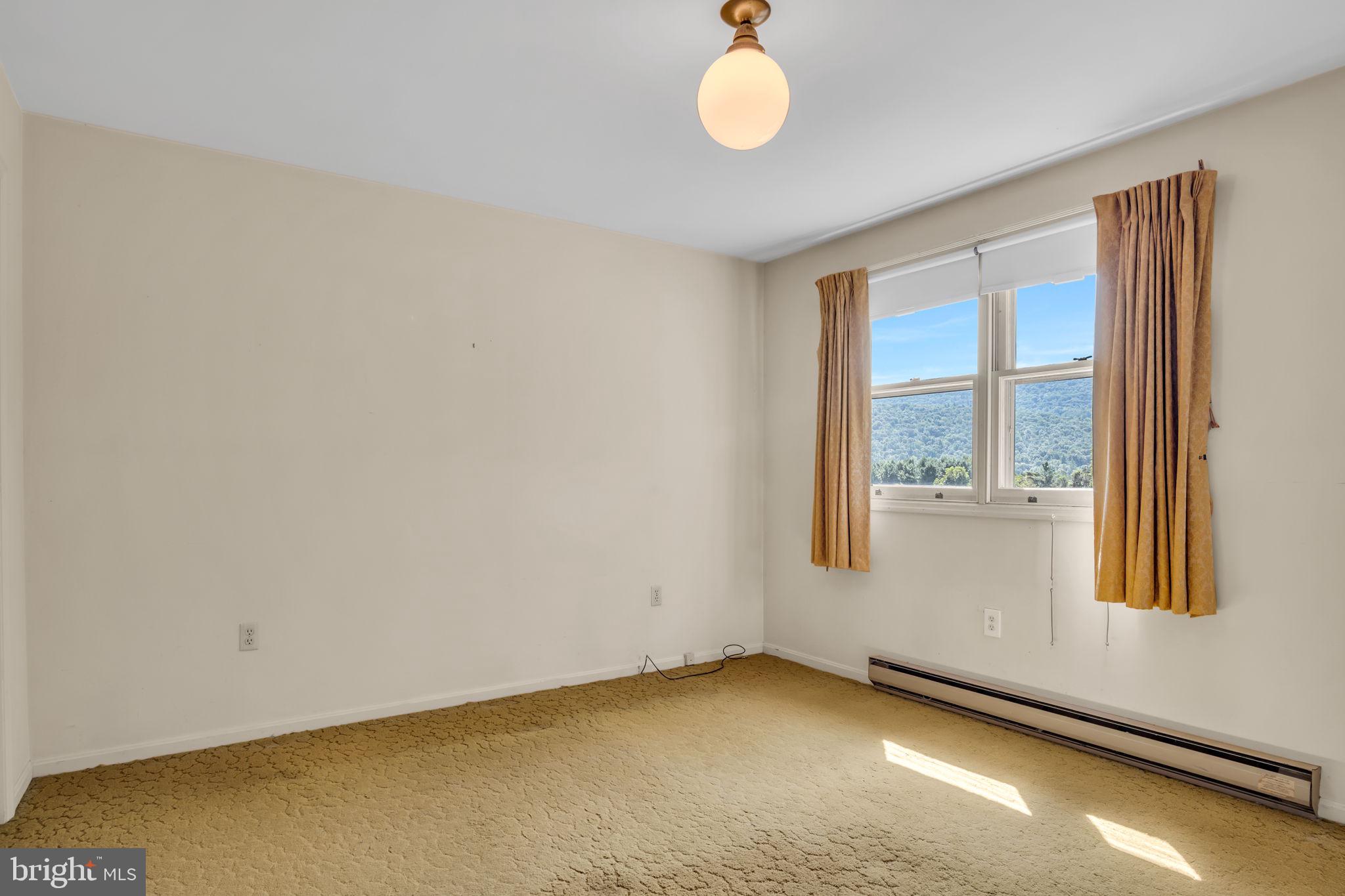 609 Dellville Road Duncannon, PA 17020 - Photo 18 of 48 an empty room with windows