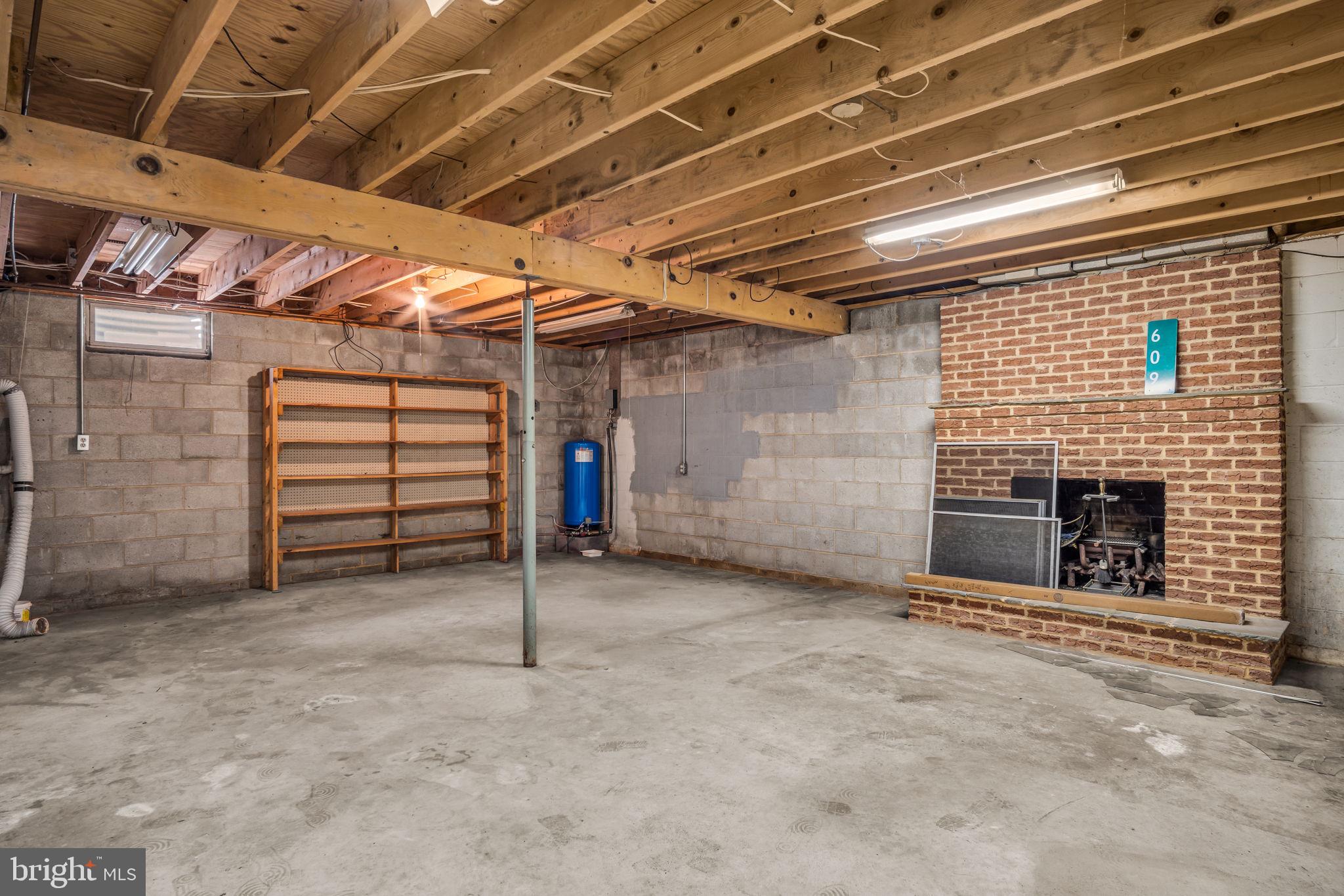 609 Dellville Road Duncannon, PA 17020 - Photo 22 of 48 a view of an empty room with a fireplace
