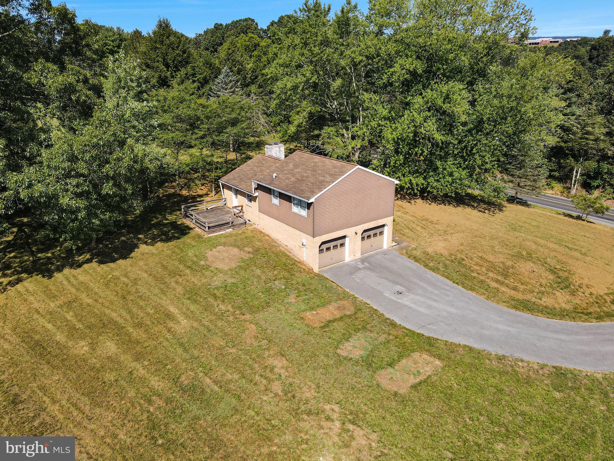 609 Dellville Road Duncannon, PA 17020 - Photo 31 of 48 a view of a house with a yard