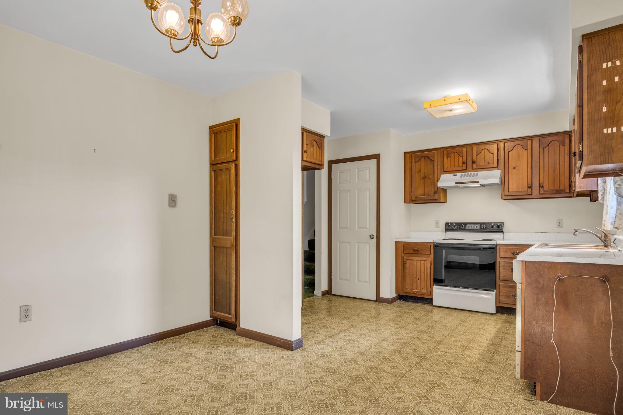 609 Dellville Road Duncannon, PA 17020 - Photo 6 of 48 a kitchen with stainless steel appliances a refrigerator and a stove top oven