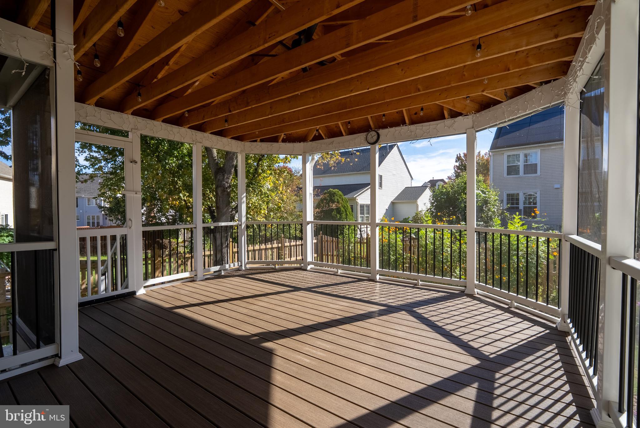 8007 Craddock Road Greenbelt, MD 20770 - Photo 17 of 59 Spacious screened porch bathed in sunlight.