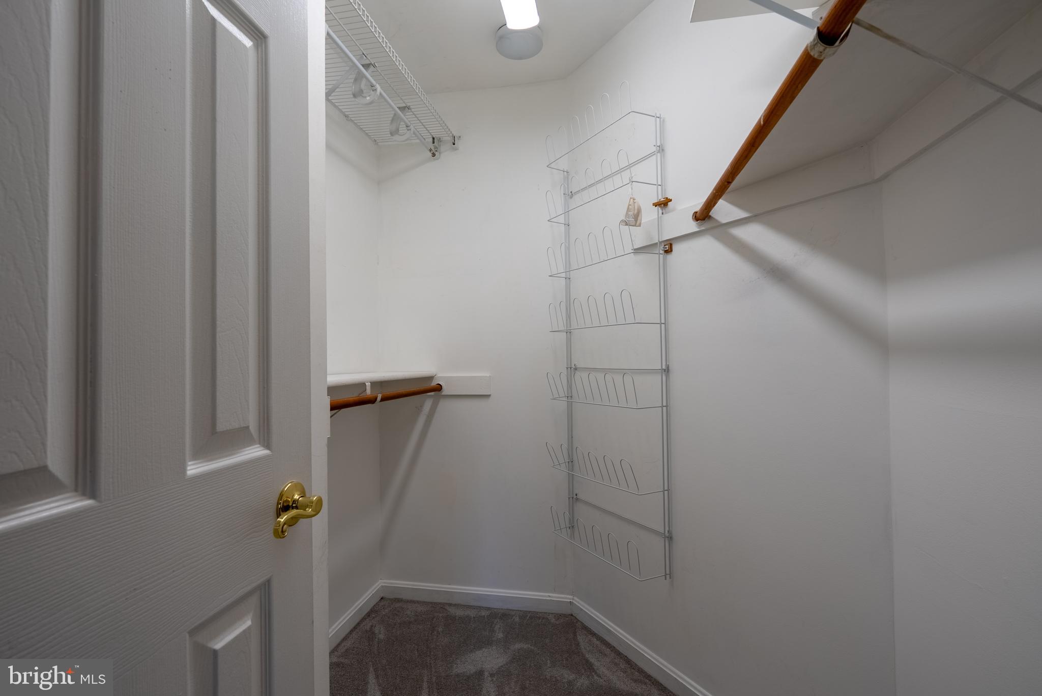 8007 Craddock Road Greenbelt, MD 20770 - Photo 24 of 59 Spacious closet with organized storage options.