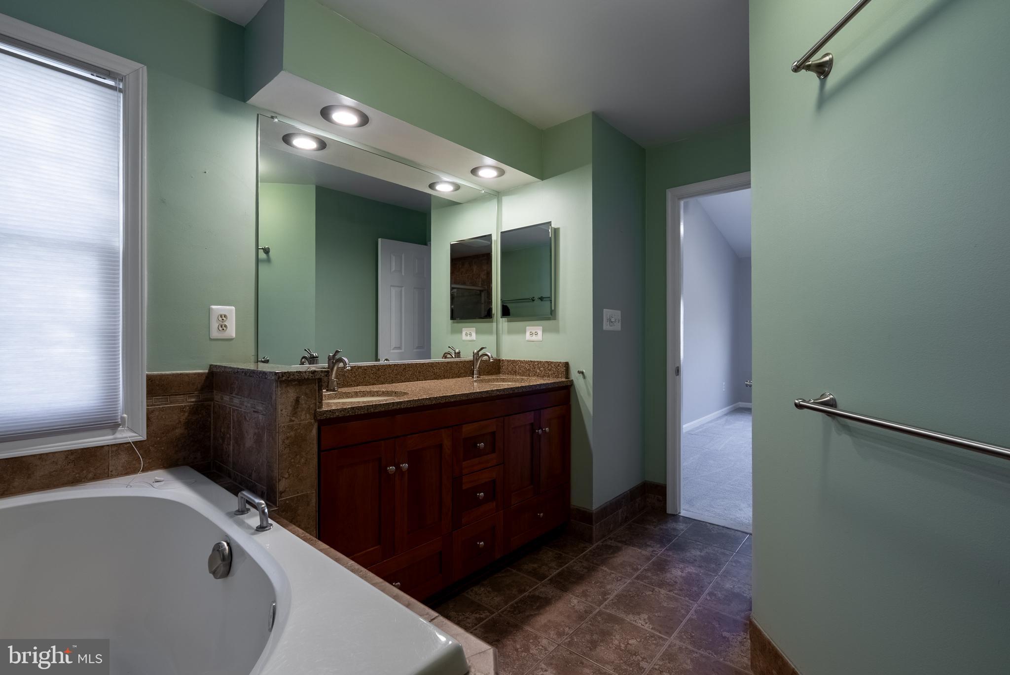 8007 Craddock Road Greenbelt, MD 20770 - Photo 28 of 59 Serene bathroom with modern finishes.