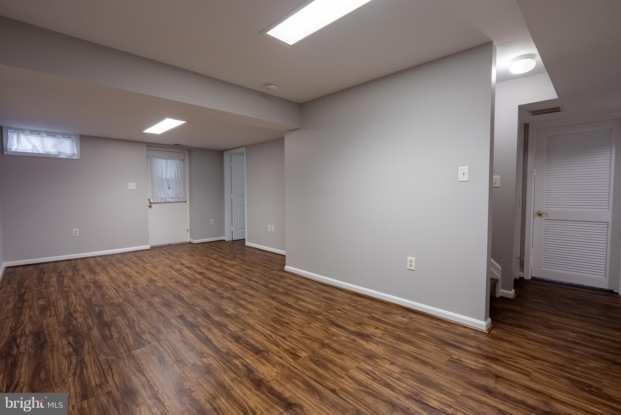 8007 Craddock Road Greenbelt, MD 20770 - Photo 37 of 59 Spacious, versatile basement with natural light.