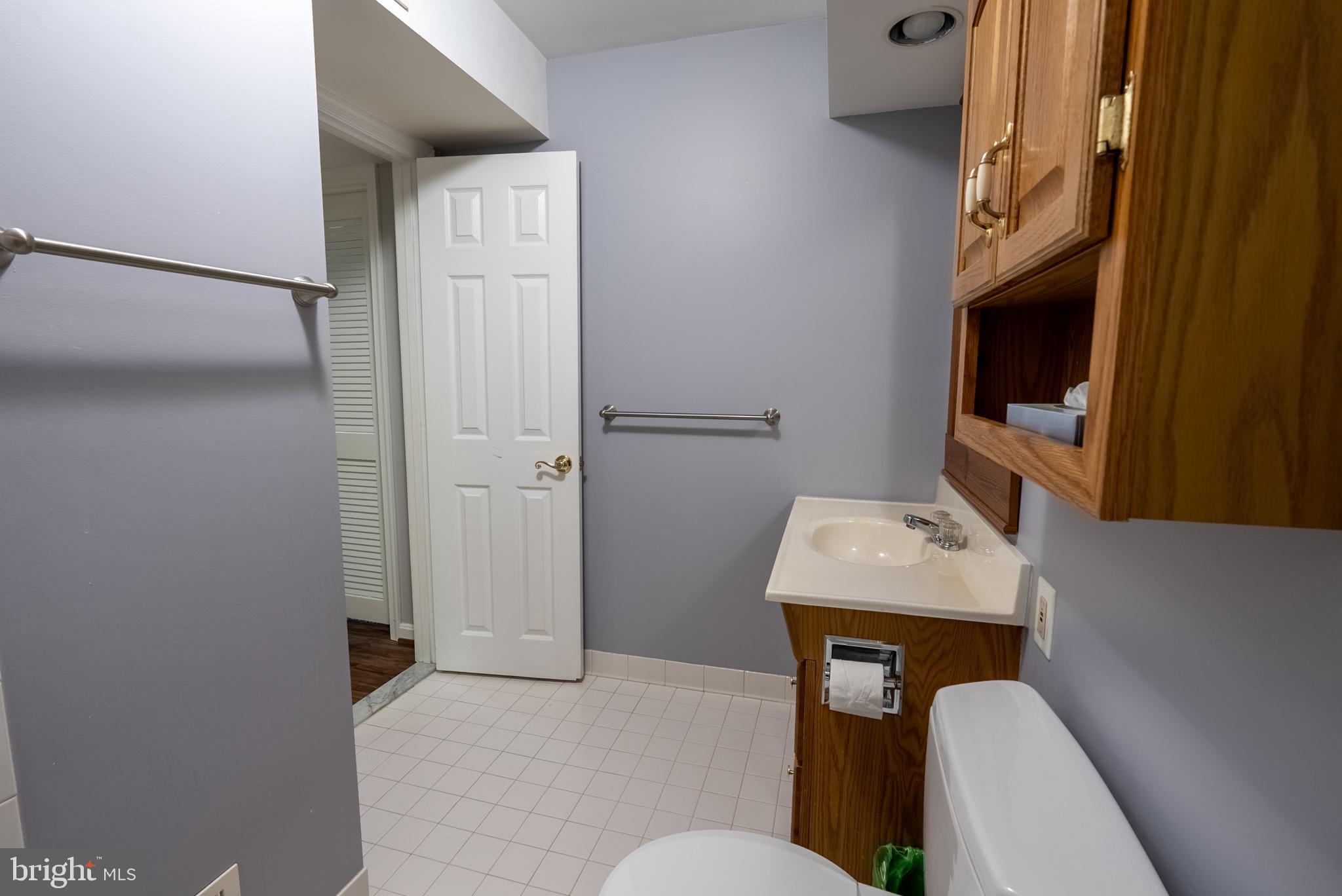 8007 Craddock Road Greenbelt, MD 20770 - Photo 47 of 59 Modern bathroom with sleek design elements.