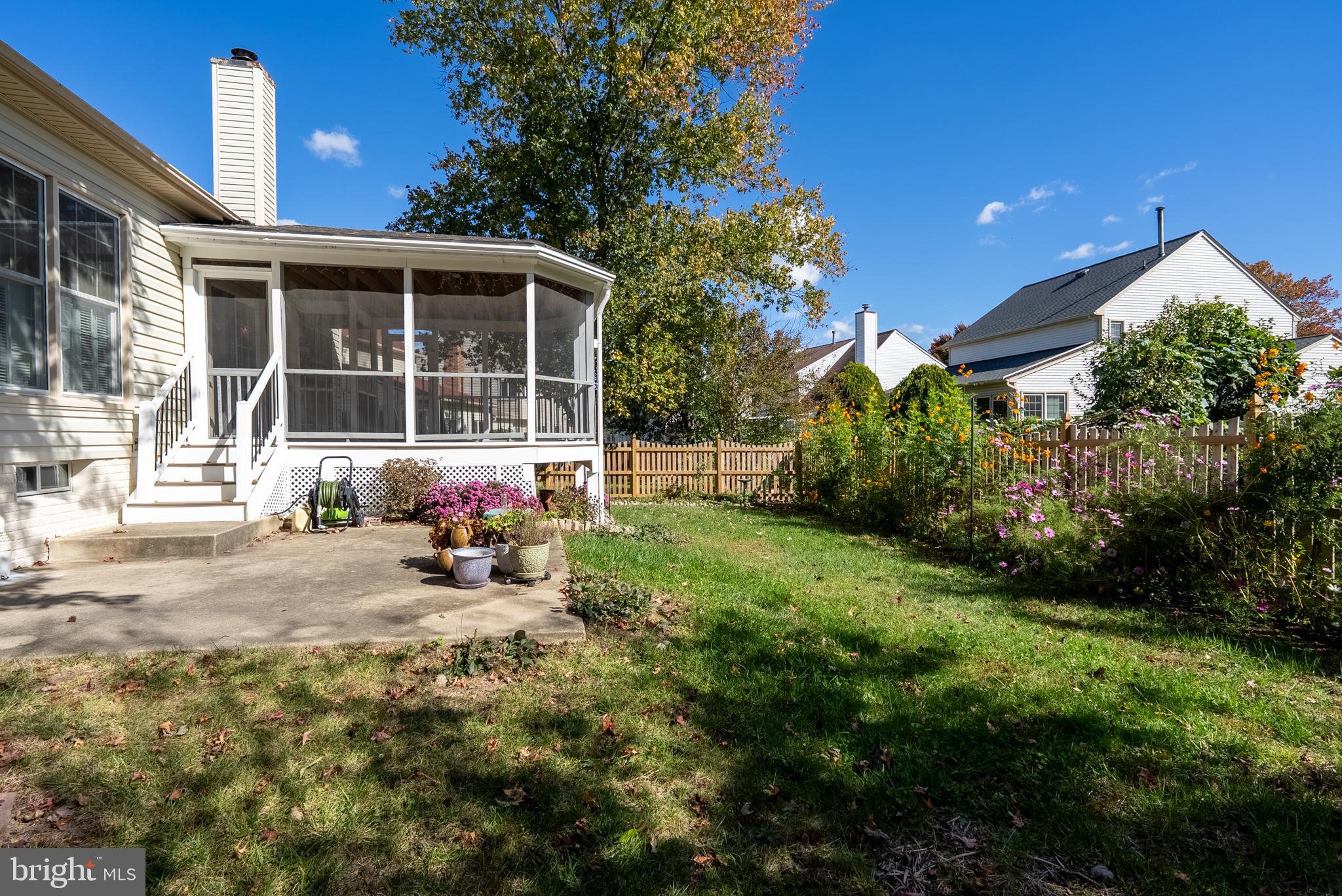 8007 Craddock Road Greenbelt, MD 20770 - Photo 54 of 59 Charming backyard retreat with lush greenery.