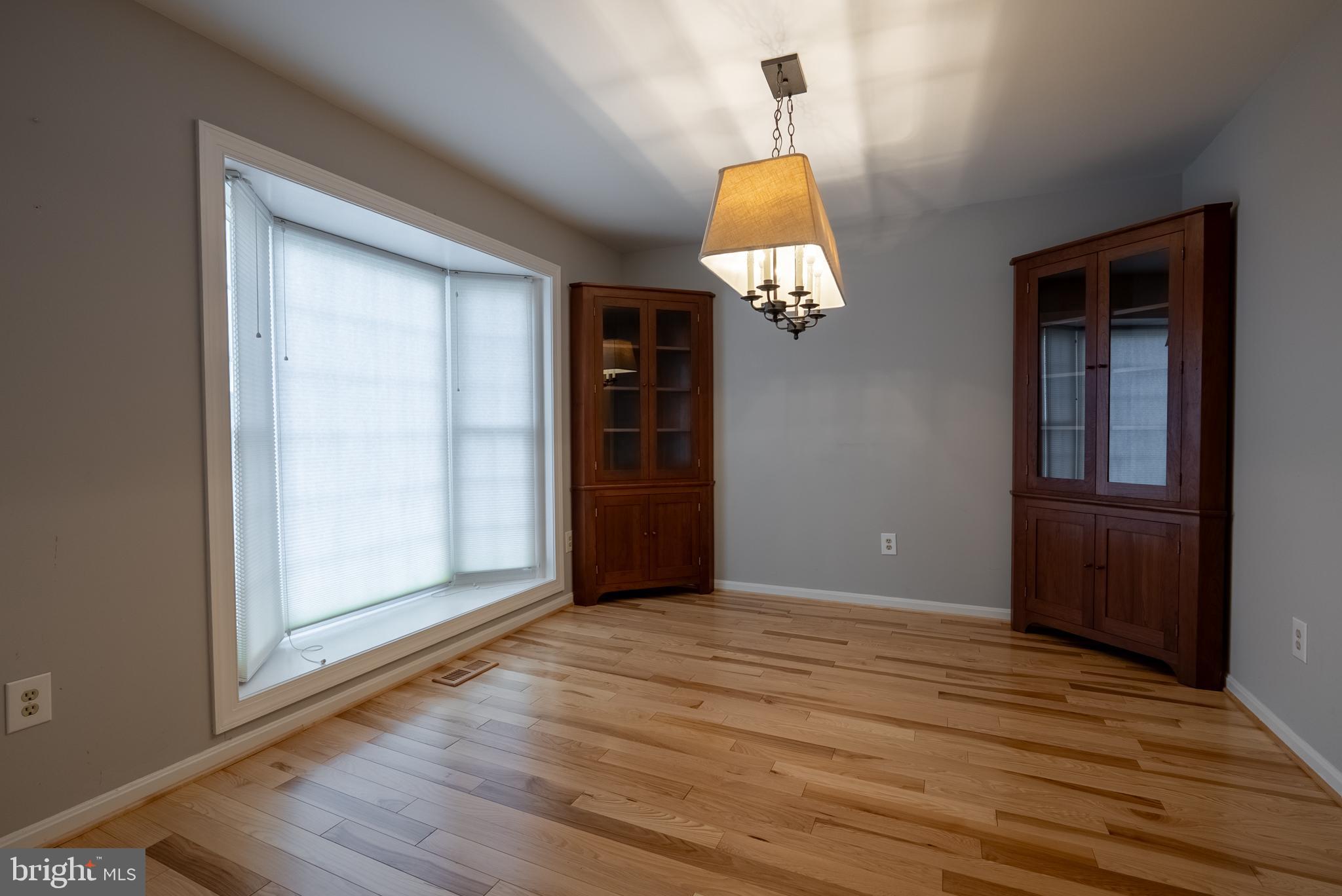 8007 Craddock Road Greenbelt, MD 20770 - Photo 6 of 59 Bright and airy space with elegant lighting.