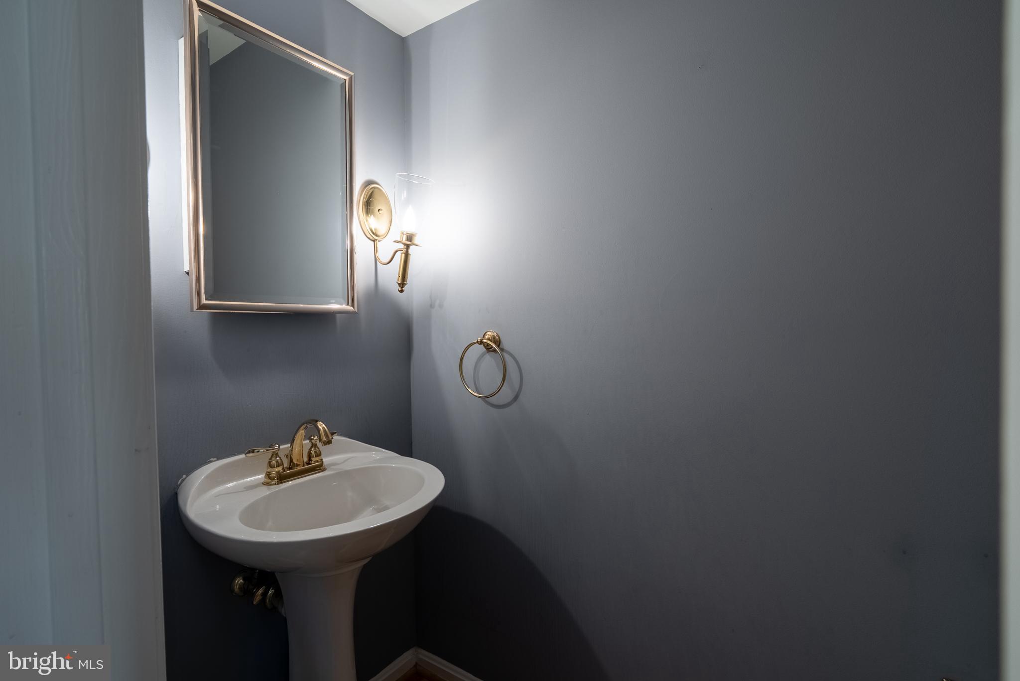 8007 Craddock Road Greenbelt, MD 20770 - Photo 8 of 59 Elegant half-bath with modern accents.