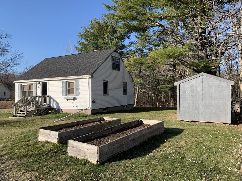 237 Greeley Road Windsor, ME 04363 - Photo 23 of 24 Side of home, shed and flower beds
