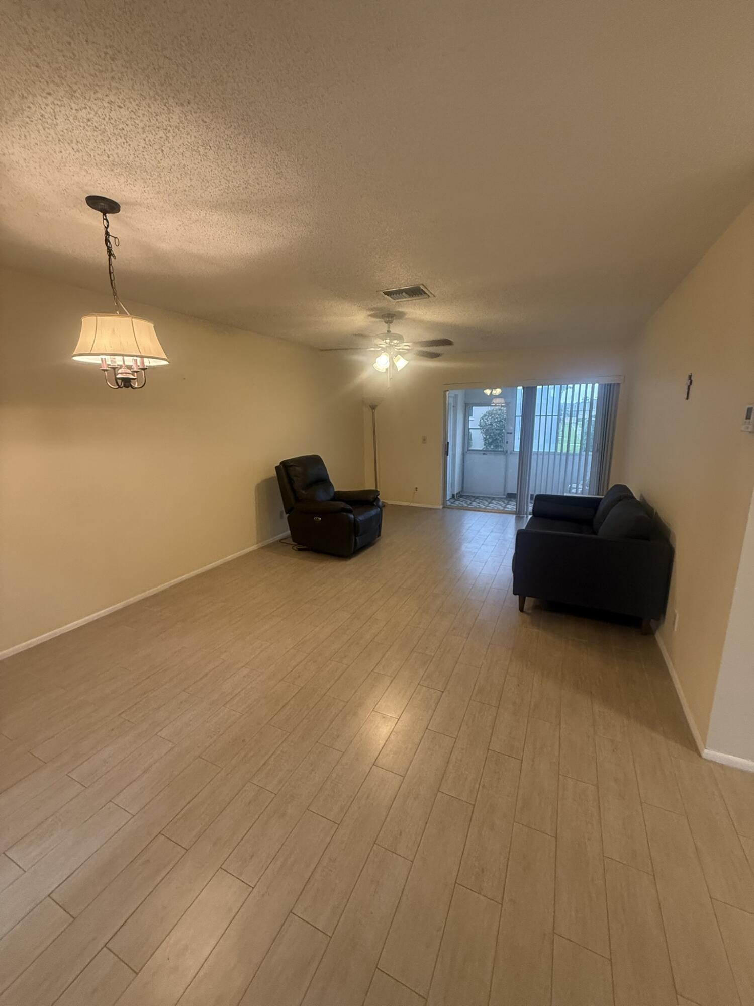 2509 Dudley C Drive West, Unit C West Palm Beach, FL 33415 - Photo 4 of 15 Living Room
