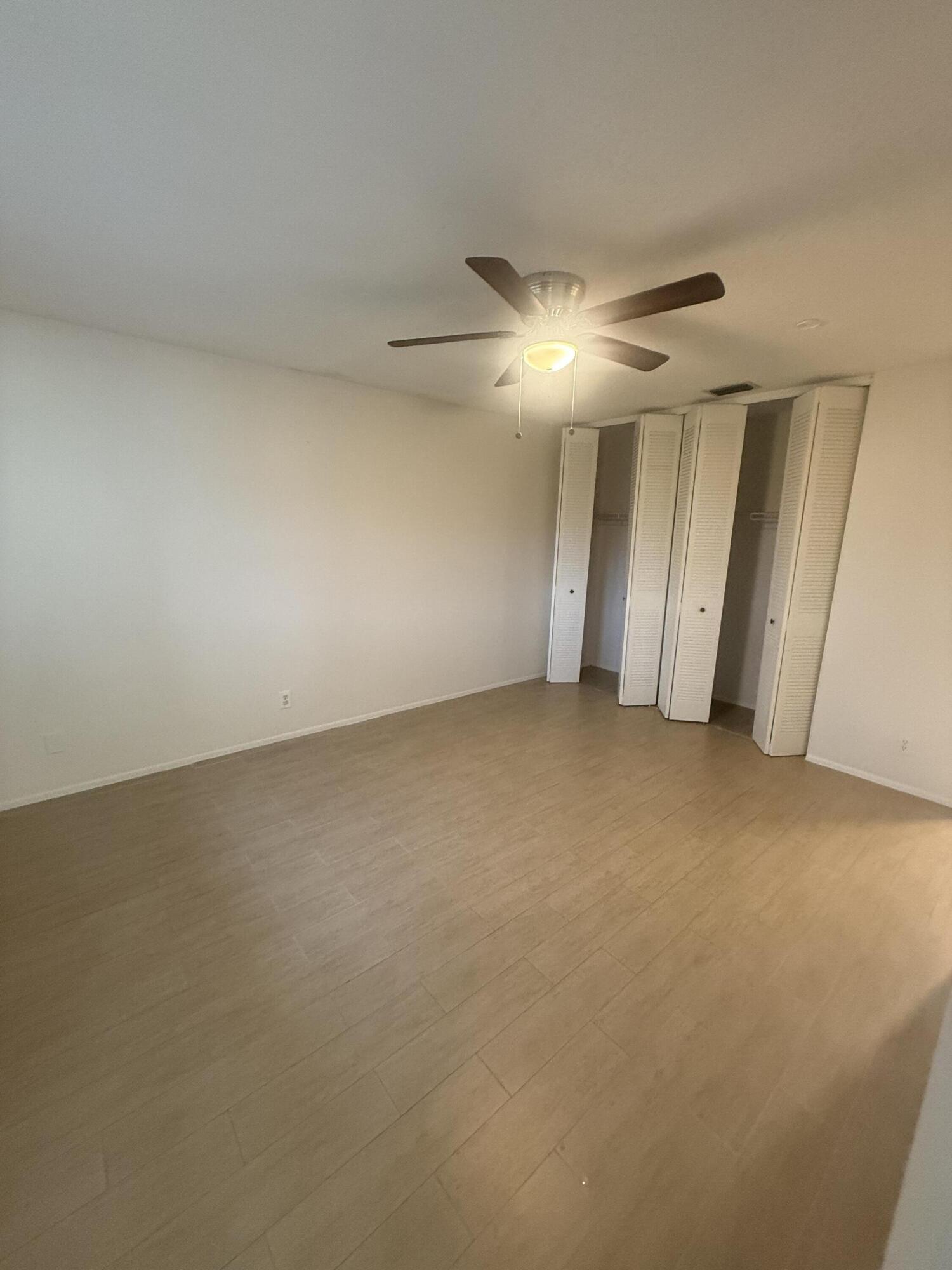 2509 Dudley C Drive West, Unit C West Palm Beach, FL 33415 - Photo 6 of 15 Primary Bedroom 1