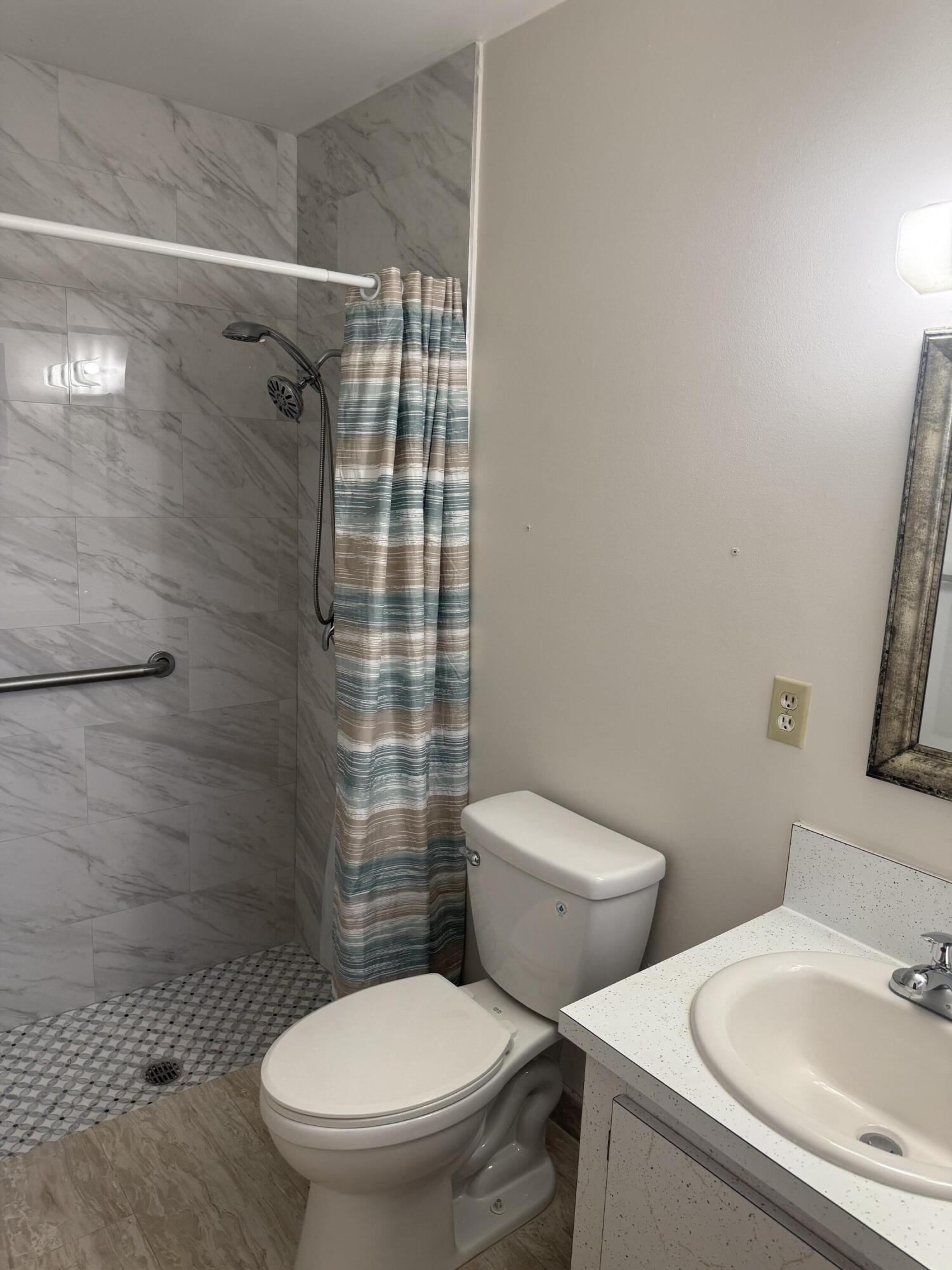 2509 Dudley C Drive West, Unit C West Palm Beach, FL 33415 - Photo 10 of 15 Primary Bath 3