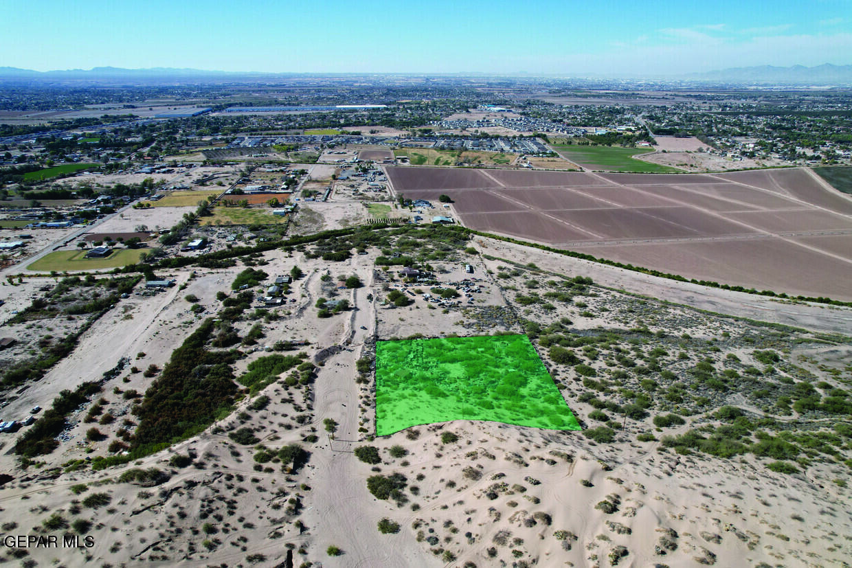 995 Anderson Road Socorro, TX 79927 - Photo 3 of 7 an aerial view of a house with a yard