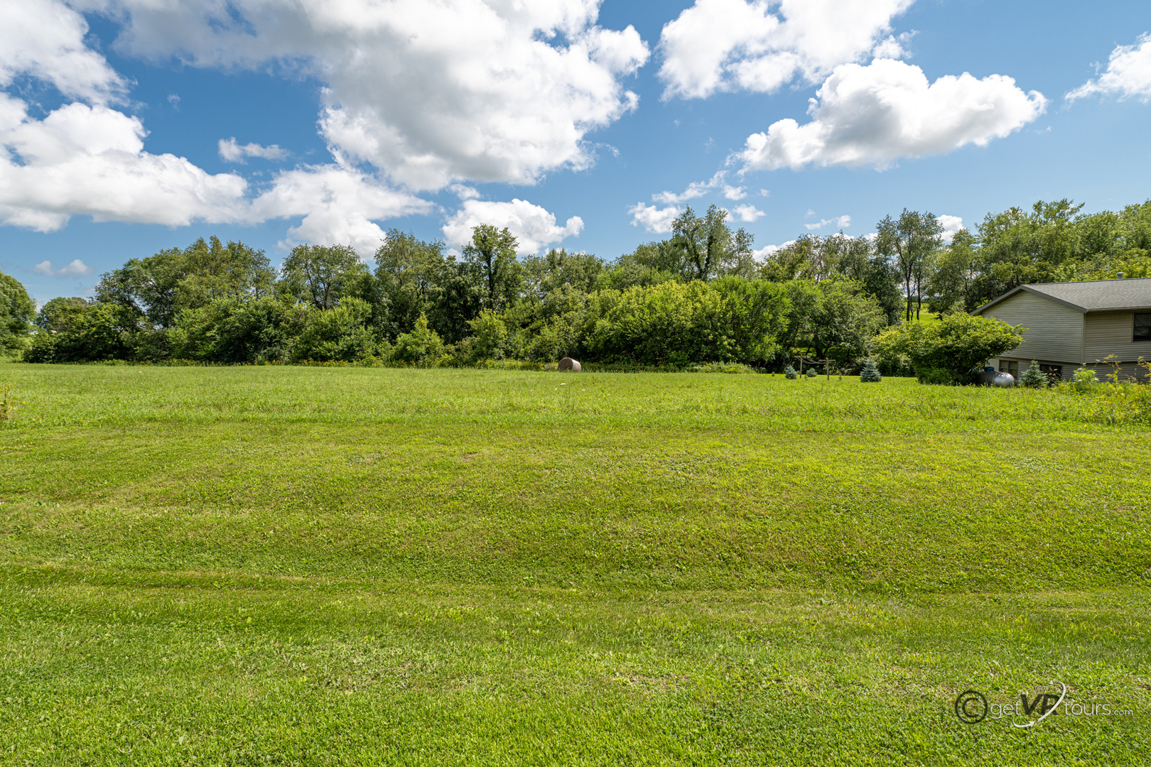 11-a19 Bunker Lane Apple River, IL 61001 - Photo 4 of 4 a view of a big yard with plants and large trees